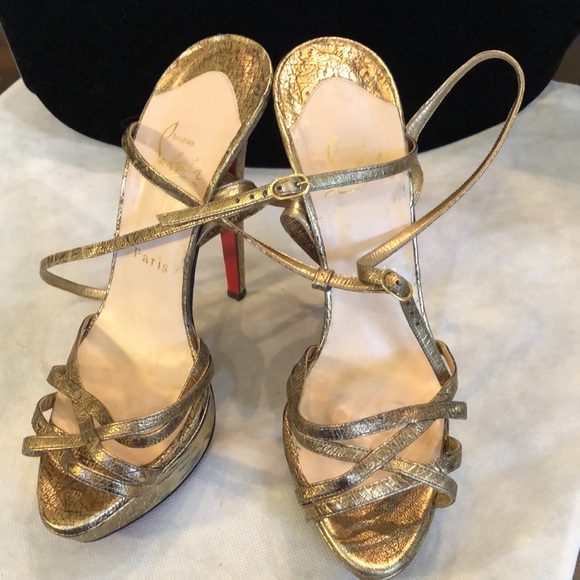 Christian Louboutin Gold metallic leather strappy buckle...
